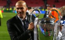FILE - In this May 24, 2014 file photo, former player and current Real Madrid B team coach Zinedine Zidane lifts the Champion League trophy, at the end of the Champions League final soccer match between Atletico Madrid and Real Madrid in Lisbon, Portugal. Real Madrids President Florentino Perez announced Monday Jan. 4, 2016 that current coach Rafael Benitez has been fired and former player and Real Madrids B team coach Zinedine Zidane will take over. Benitez, hired seven months ago, has been under pressure since a demoralizing 4-0 home loss to Barcelona in November. (AP Photo/Andres Kudacki, File)