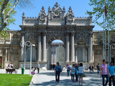 Istanbul, tourists at the entrance of the Dolmabahce Palace