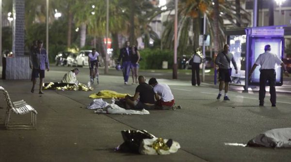 ATTENTION EDITORS - VISUAL COVERAGE OF SCENES OF INJURY OR DEATH - Bodies are seen on the ground July 15, 2016 after at least 30 people were killed in Nice, France, when a truck ran into a crowd celebrating the Bastille Day national holiday July 14.   REUTERS/Eric Gaillard