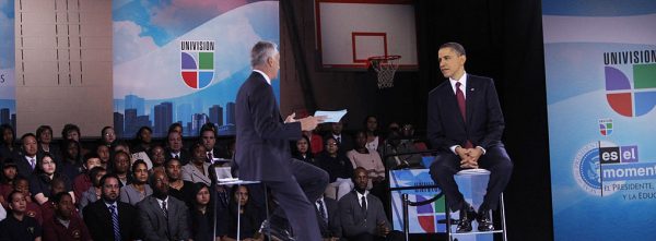 WASHINGTON - MARCH 28:  U.S. President Barack Obama (R) speaks as moderator Jorge Ramos listens during an education town hall hosted by Univision at Bell Multicultural High School, Washington, DC. Obama is set to speak to the nation in the evening about the U.S. role in Libya.   (Photo by Dennis Brack-Pool/Getty Images)
