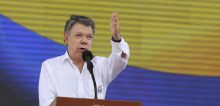 Colombia's President Juan Manuel Santos speaks during an event to promote the "yes" vote in the upcoming referendum on the peace deal he signed with rebels of the Revolutionary Armed Forces of Colombia, FARC, in Soacha, on the outskirts of Bogota, Colombia, Friday, Sept. 30, 2016.  Colombians go to the polls on Oct. 2 in a referendum where they will be asked to ratify or reject the deal. (AP Photo/Fernando Vergara)/XRM101/16274649145669/1609302026