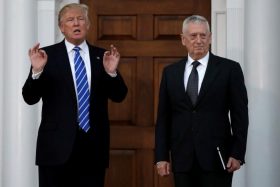 FILE PICTURE: U.S. President-elect Donald Trump stands with retired Marine Gen. James Mattis following their meeting at the main clubhouse at Trump National Golf Club in Bedminster, New Jersey, U.S., November 19, 2016.  REUTERS/Mike Segar/File Photo