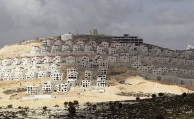 Houses under construction are seen in the West Bank city of Ramallah March 14, 2012. Growth in the West Bank is concentrated in Ramallah and in real estate and services even as many sectors like agriculture and construction languish. Picture taken March 14, 2012. To match Feature PALESTINIANS-ECONOMY/   REUTERS/Ammar Awad (WEST BANK - Tags: BUSINESS CONSTRUCTION REAL ESTATE TPX IMAGES OF THE DAY ENVIRONMENT)