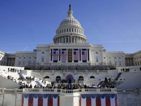 The U.S. Capitol looms over a stage during a rehearsal of President-elect Donald Trump's swearing-in ceremony, Sunday, Jan. 15, 2017, in Washington. (AP Photo/Patrick Semansky)/DCPS102/17015687854927/1701152010