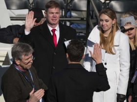 Army Sgt. Maj. Greg Lowery, left, and Army Spc. Sara Corry, stand in for President-elect Donald Trump and Melania Trump during a rehearsal of the swearing-in ceremony at the U.S. Capitol, Sunday, Jan. 15, 2017, in Washington. (AP Photo/J. David Ake)/DCDA101/17015657238285/1701151925
