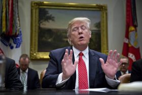 U.S. President Donald Trump speaks as he meets with county sheriffs during a listening session in the Roosevelt Room of the White House in Washington, D.C., U.S., on Tuesday, Feb. 7, 2017. The Trump administration will return to court Tuesday to argue it has broad authority over national security and to demand reinstatement of a travel ban on seven Muslim-majority countries that stranded refugees, triggered protests and handed the young government its first crucial test. Photographer: Andrew Harrer/Bloomberg