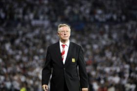 Manchester United's manager Alex Ferguson walks before their Champions League soccer match aganist Besiktas at the Inonu Stadium in Istanbul in this September 15, 2009 file photograph. Alex Ferguson, Britain's longest-serving and most decorated soccer manager, will retire at the end of the season after more than 26 years and nearly 1,500 matches at the helm of Manchester United, he announced on May 8, 2013.  REUTERS/Osman Orsal/Files    (TURKEY - Tags: SPORT SOCCER)