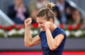 MADRID, SPAIN - MAY 13: Simona Halep of Romania celebrates defeating Kristina Mladenovic of France in the final during day eight of the Mutua Madrid Open tennis at La Caja Magica on May 13, 2017 in Madrid, Spain. (Photo by Julian Finney/Getty Images)