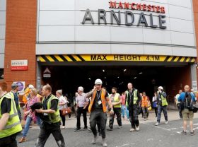 People rush out of the Arndale shopping centre as it is evacuated in Manchester, Britain May 23, 2017. REUTERS/Darren Staples
