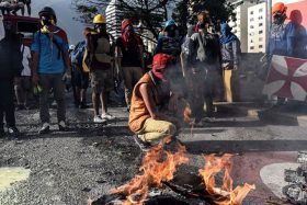 CARACAS, VENEZUELA - JUNE 26: Protesters set up fire during a protest demanding Venezulan President Nicolas Maduro's resignation and new elections in Caracas on June 26, 2017 A political and economic crisis in the oil-producing country has spawned often violent demonstrations by protesters demanding Maduro's resignation and new elections. The unrest has left 75 people dead since April 1. Carlos Becerra / Anadolu Agency