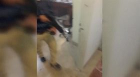 A still image taken from a video released on the internet by Islamic State-affiliated Amaq News Agency, on June 7, 2017, purports to show a man with a gun walking in office said to be inside Iranian parliament in Tehran, Iran. Social Media Website via Reuters TV