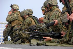 051007-M-2175L-107 Guinea (Oct. 7, 2005)  U.S. Marines assigned to 2d Platoon, Company C, 1st Battalion, 8th Marine Regiment, take a look at their targets following marksmanship training aboard the dock landing ship USS Gunston Hall (LSD 44). The embarked Marines are participating in the Western Africa Training Cruise 06.  Operating from Gunston Hall, the Marines will be involved with training exercises in three western Africa countries along with NATO military allies from Italy and Spain. Various exercises are scheduled to take place in Guinea, Ghana and Senegal to increase interoperability between those involved as well as enhancing security and stability in the region. U.S. Marine Corps photo by Gunnery Sgt. Joseph Lomangino (RELEASED)