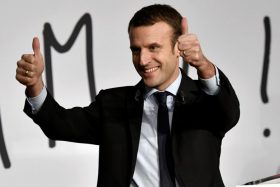 Former French Economy Minister, founder and president of the political movement "En Marche !" and candidate for the 2017 presidential elections Emmanuel Macron gestures as he delivers a speech during a public meeting on December 13, 2016 in Talence, southwestern France. / AFP / GEORGES GOBET        (Photo credit should read GEORGES GOBET/AFP/Getty Images)