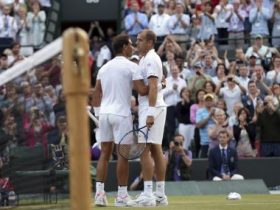 Luxembourg's Gilles Muller, right, greets Spain's Rafael Nadal after winning their Men's Singles Match on day seven at the Wimbledon Tennis Championships in London Monday, July 10, 2017. (AP Photo/Tim Ireland)