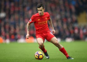 LIVERPOOL, ENGLAND - JANUARY 21: Philippe Coutinho of Liverpool in action during the Premier League match between Liverpool and Swansea City at Anfield on January 21, 2017 in Liverpool, England.  (Photo by Julian Finney/Getty Images)