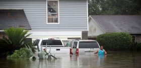 HOUSTON, TX - AUGUST 28: People wait to be rescued from their flooded homes after the area was inundated with flooding from Hurricane Harvey on August 28, 2017 in Houston, Texas. Harvey, which made landfall north of Corpus Christi late Friday evening, is expected to dump upwards to 40 inches of rain in Texas over the next couple of days.   Joe Raedle/Getty Images/AFP