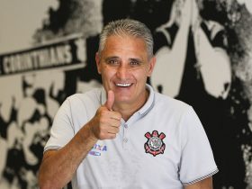 FILE - Corinthians soccer coach Adenor Leonardo Bacchi, known as Tite, flashes a thumbs up as he poses after a team training session at the Itaquerao stadium, in Sao Paulo, Brazil, on December 5, 2015. Photo: AP